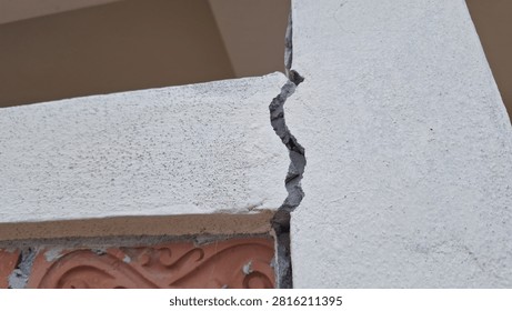 Severe structural crack between concrete beam and wall for building defect inspection.