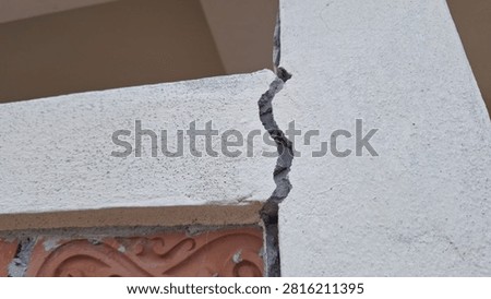 Severe structural crack between concrete beam and wall for building defect inspection.