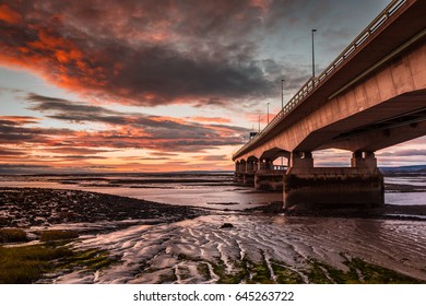 Severn Bridge Over Bristol Channel At Sunset. Severn Beach, UK