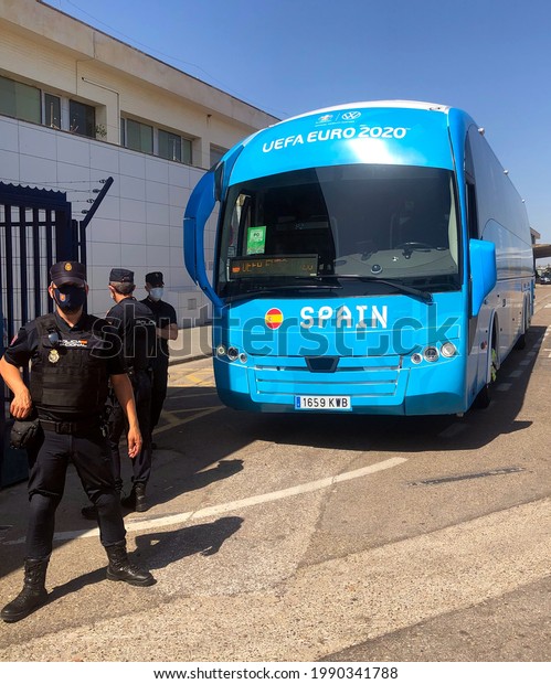 Seville Airport, Spain; June 13 of 2021: UEFA Euro\
2020 Football Championship, Spanish National Team official bus\
guarded by the police while waiting for the team to Seville, one of\
its venues