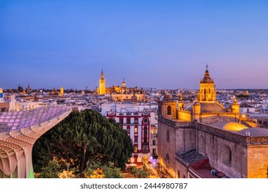 Seville City Skyline view with Illuminated Space Metropol Parasol in the Foreground at Dusk, Seville, Spain - Powered by Shutterstock