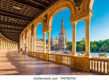 SEVILLE, ES - JULY 28, 2017: Plaza de Espana is an architectural ensemble located in the Maria Luisa Park in Seville, Spain. It was built as the main building of the Ibero-American Exposition of 1929.