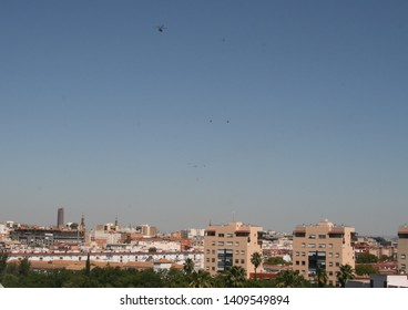 Seville, Spain; 28 May 2019: Several Military Aircraft And Helicopters Fly Over Seville In The Test Of Spanish National Day Army Parade. - Imagen