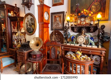 SEVILLE, SPAIN - APRIL 28, 2012: Old furniture and household items in antiques shop