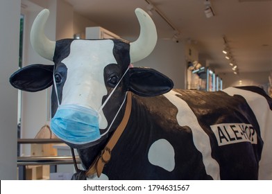 Seville, Spain; August 12, 2020: Ale-Hop Cow Wearing A Face Mask.  Covid-19 Prevention.