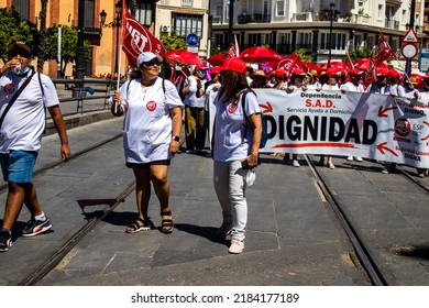 Seville Spain June 25, 2022 Employees And Domestic Staff Working In Personal Assistance Taking Part In A Demonstration In The City Center Of Seville During The Coronavirus Outbreak Hitting Spain