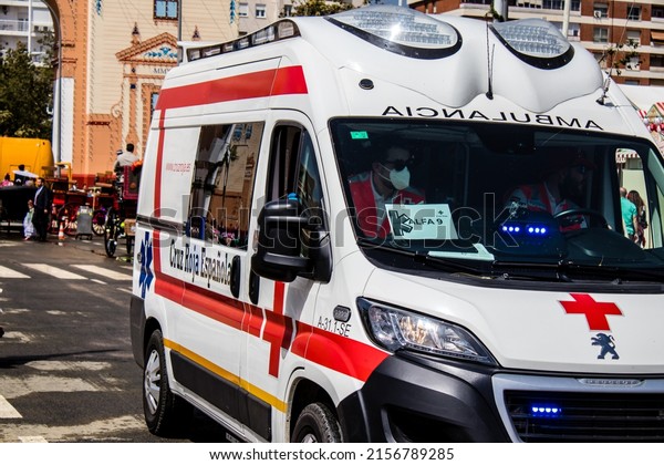Seville, Spain - May 05,\
2022 Ambulance rolling at Feria de Sevilla, Spain\'s most famous\
festival, This celebration is back after two years of absence due\
to covid epidemic