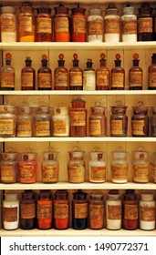 Seville, Spain - May16, 2012: Antique Apothecary Jars Of Glass With Medicinal Compounds On The Old Pharmacy Shelve