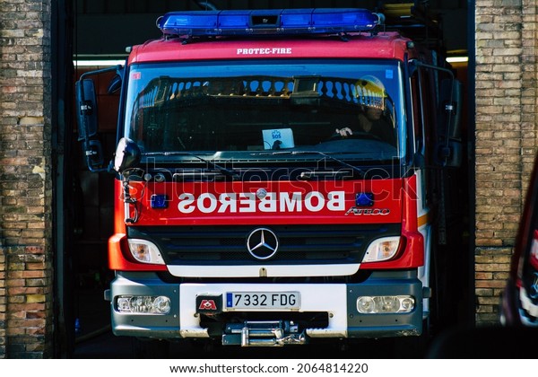 Seville\
Spain September 22, 2021 Fire engine parked at the fire station of\
the city center of Seville, an emblematic city and the capital of\
the region of Andalusia, in the south of\
Spain