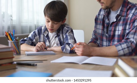 Seville/Spain - 03/28/2019 child do homework in the home