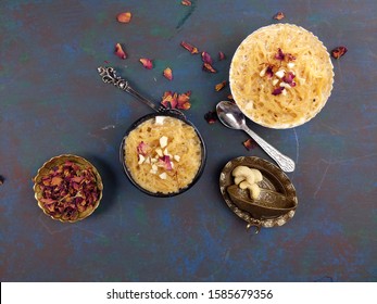 Seviyan Or Vermicelli Kheer, An Indian Dessert Made Of Semolina Noodles Topped With Rose Petals And Dry Fruits Such As Cashews.