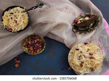 Seviyan Or Vermicelli Kheer, An Indian Dessert Made Of Semolina Noodles Topped With Rose Petals And Dry Fruits Such As Cashews.