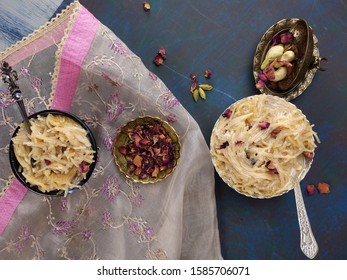 Seviyan Or Vermicelli Kheer, An Indian Dessert Made Of Semolina Noodles Topped With Rose Petals And Dry Fruits Such As Cashews.