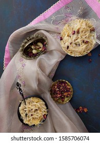 Seviyan Or Vermicelli Kheer, An Indian Dessert Made Of Semolina Noodles Topped With Rose Petals And Dry Fruits Such As Cashews.