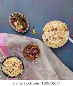 Seviyan Or Vermicelli Kheer, An Indian Dessert Made Of Semolina Noodles Topped With Rose Petals And Dry Fruits Such As Cashews.