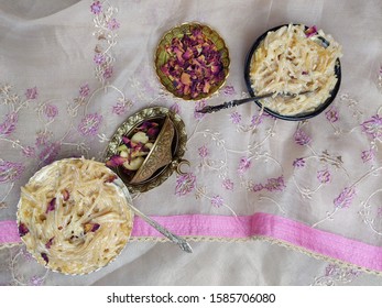 Seviyan Or Vermicelli Kheer, An Indian Dessert Made Of Semolina Noodles Topped With Rose Petals And Dry Fruits Such As Cashews.