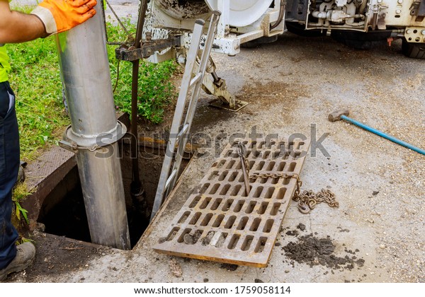 Sewage industrial cleaning truck clean\
blockage in a sewer line machine from the\
inside.