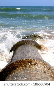 Sewage Pipe Having Their Outlet Right Into The Ocean Pollutiong The Water.
