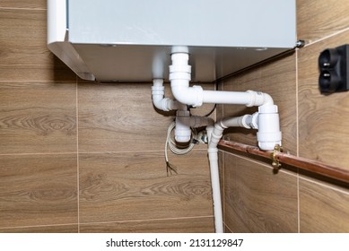 Sewage pipes for drainage of condensate from the domestic mechanical ventilation with heat recovery. - Shutterstock ID 2131129847