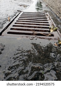 A Sewer Grate In Town