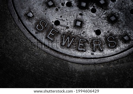 Sewer manhole cover maintenance iron steel access to utility