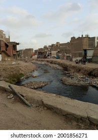 A sewerage drain flowing into the poor neighborhood - Karachi Pakistan - Jun 2021