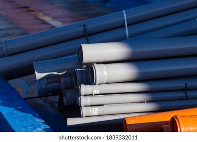 Sewerage And Drainage Pipes. Wholesale Store Building Materials. Abstract Universal Background