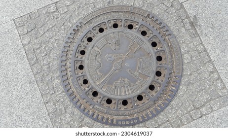 Sewerage manhole cover of cast iron in Berlin, Germany