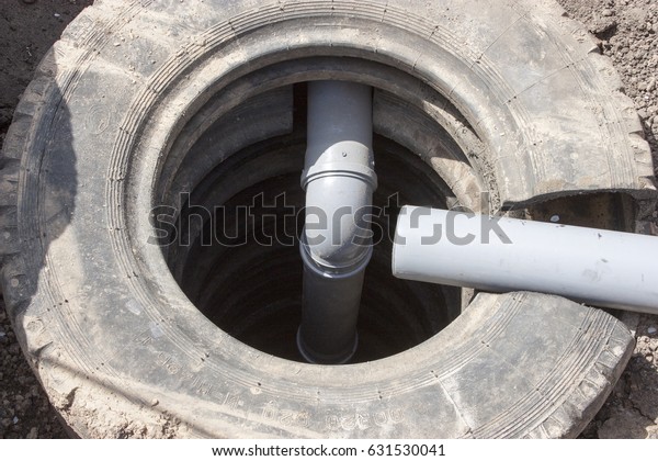 Sewerage system. Drain\
pit from car tires.