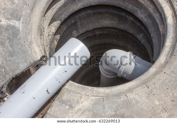 Sewerage system. Drain\
pit from car tires.