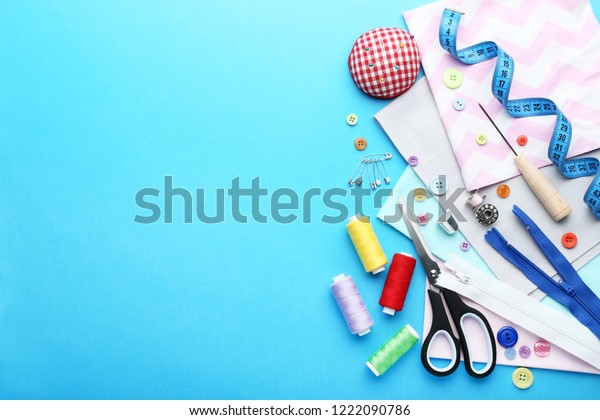Sewing Accessories On Blue Background Stock Photo 1222090786 | Shutterstock