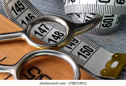 sewing accessories on wooden background - Shutterstock ID 1788714911