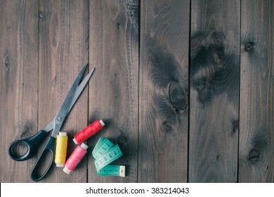 Sewing Accessories On Wooden Table, Top View