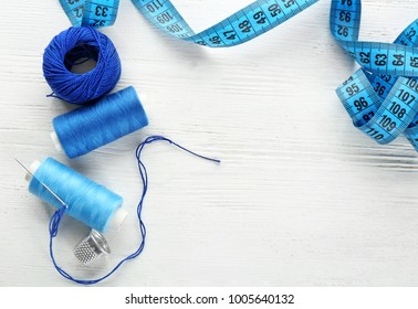 Sewing Accessories And Threads On Table, Top View