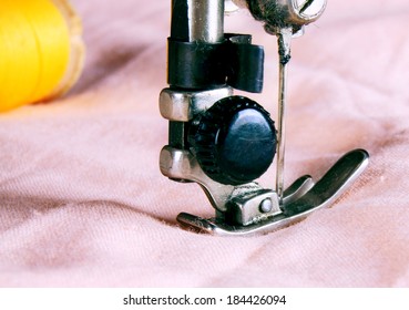The sewing machine close-up.