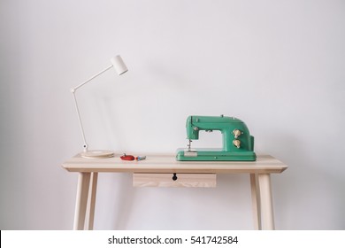 Sewing machine with desk light - Powered by Shutterstock