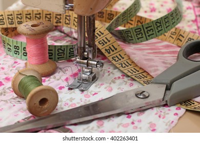 sewing machine, dressmaker scissors and thread-style retro