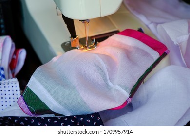 Sewing machine and fabric for making face mask - Shutterstock ID 1709957914