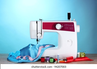 Sewing Machine Fabric On Blue Background Stock Photo 94207003 ...