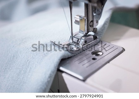 Sewing machine needle stitching white fabric, sewing, needlework