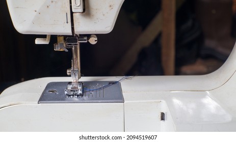 Sewing machine on table, close up