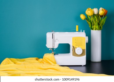 Sewing Machine On Table In Workshop