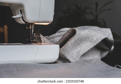 Sewing machine on a table in a sewing workshop, top view.  New opportunity concepts