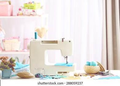 Sewing Machine On Table In Workshop