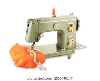 Sewing machine with orange fabric, measuring tape and spools of threads isolated on white - Powered by Shutterstock