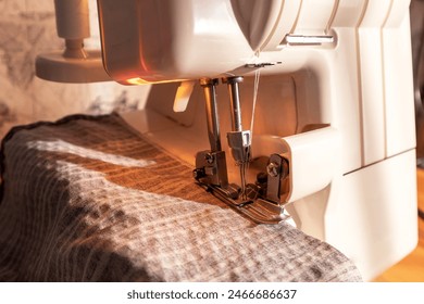 Sewing machine, overlocker, serger close up view, overlock seam. - Powered by Shutterstock