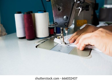 sewing machine sew women's hands