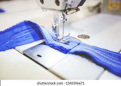 sewing machine with thread - Shutterstock ID 1345596671