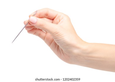 Sewing Needle In Hand On A White Background. Isolation