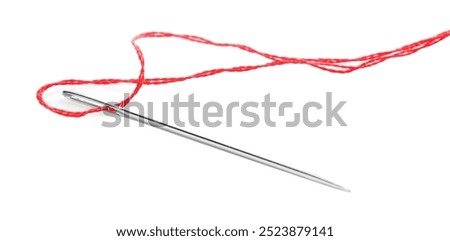 Sewing needle with red thread isolated on white